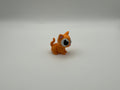 Orange cat figurine