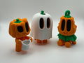 Trick or treat pumpkin figurines